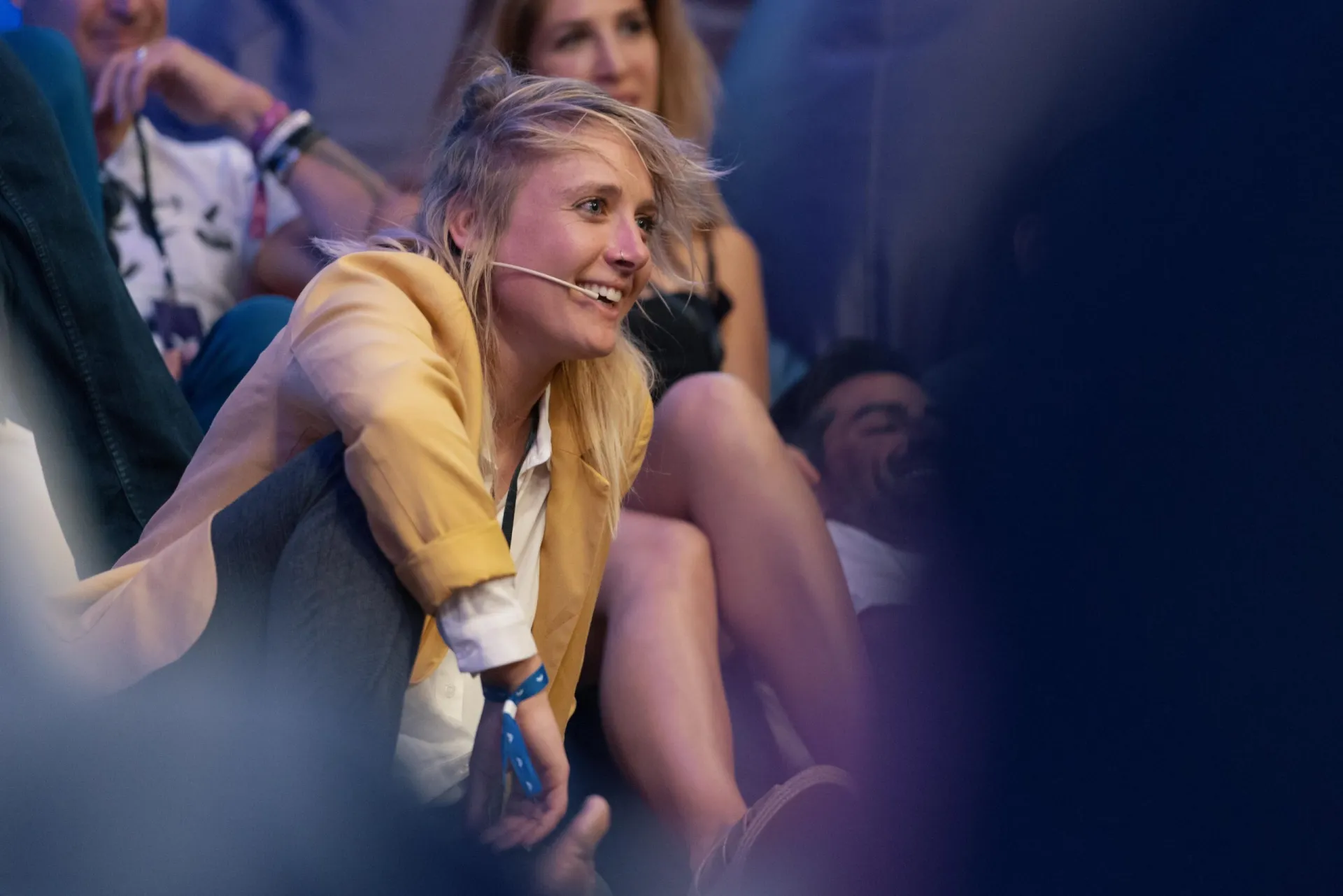 Nicole Gibson smiling in a crowd at an event